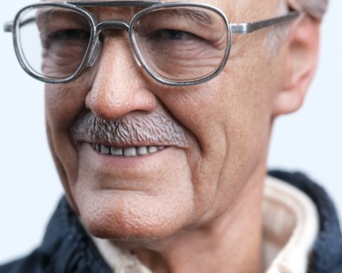 man in black framed eyeglasses