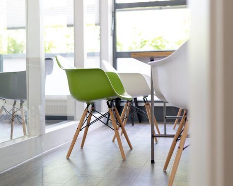 two chairs near the window