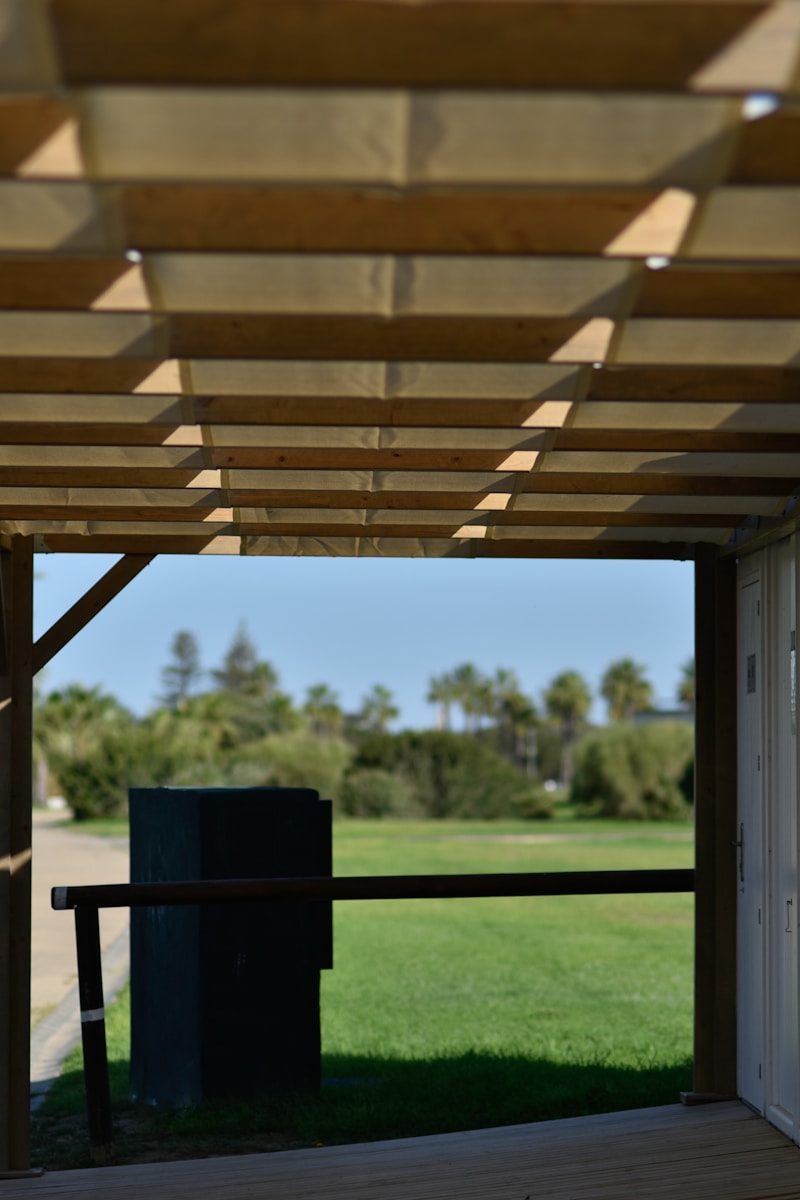 a view of a park from a covered area