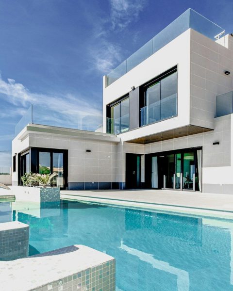 white concrete building under blue sky during daytime